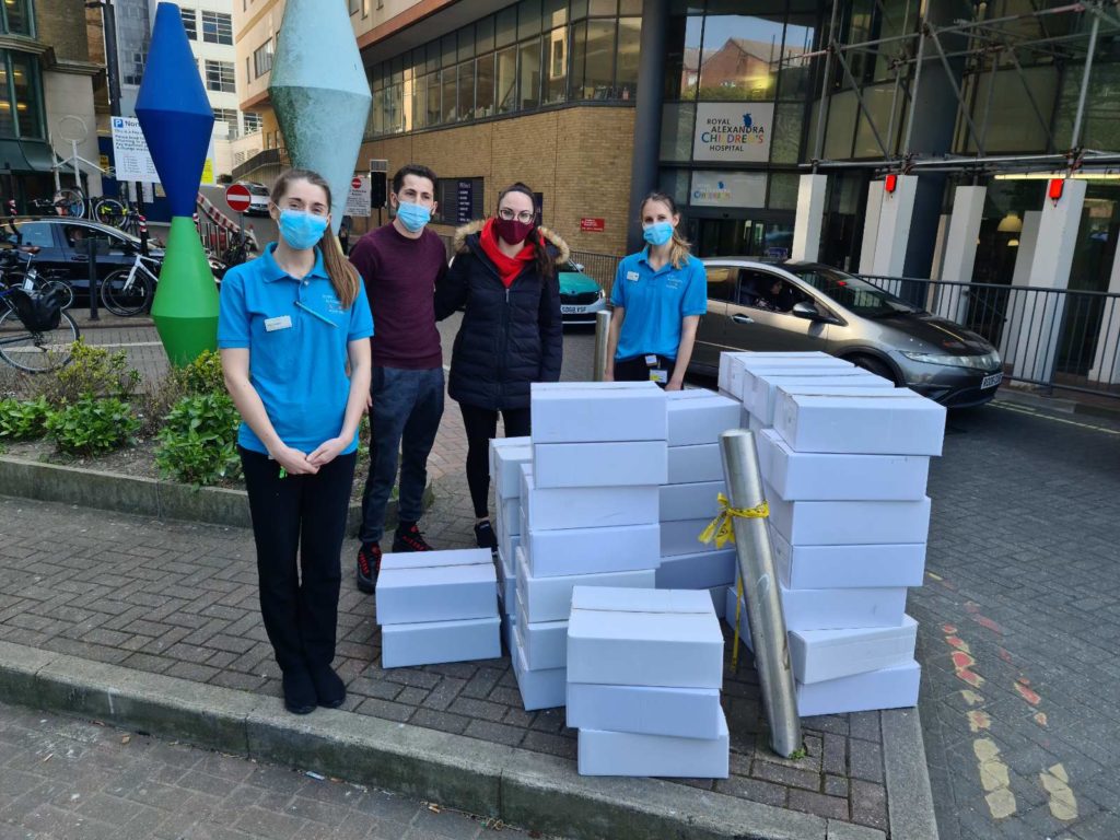 team infront of packages